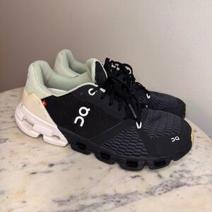 On Running Black and White Athletic Shoes